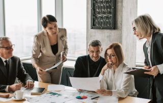 Leadership team meeting around a conference table
