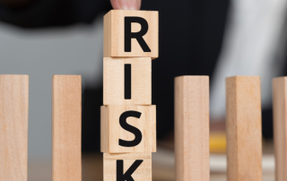 Wooden blocks spelling risk